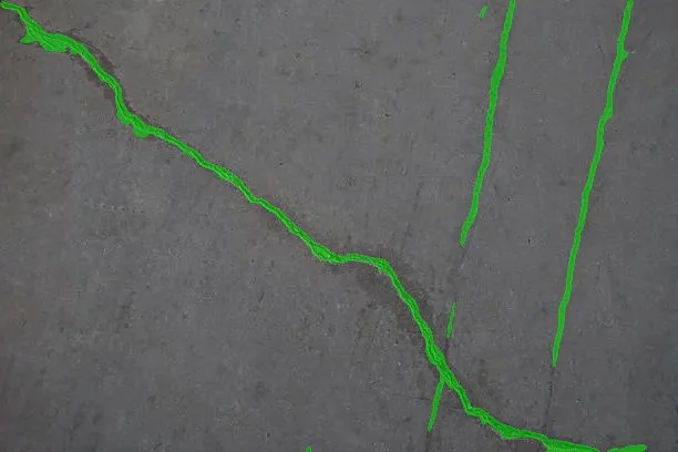 Detected cracks overlaid on the input